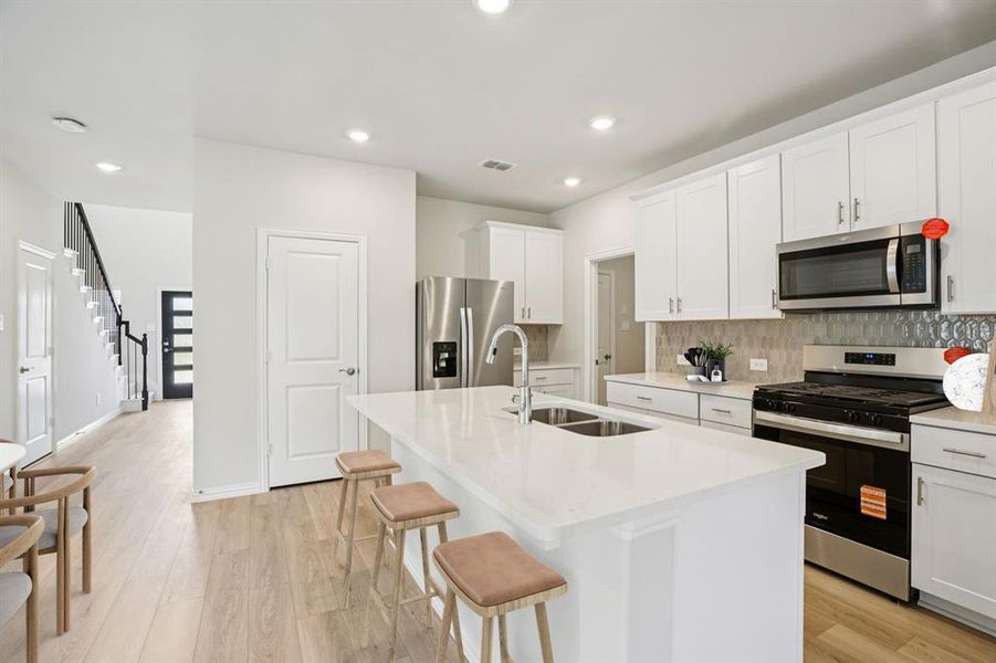 Furnished interior view inside a new home in Simpson Crossing - Spring Series, McKinney (Image 11). Furnished interior view inside a new home in Simpson Crossing - Spring Series, McKinney (Image 11).