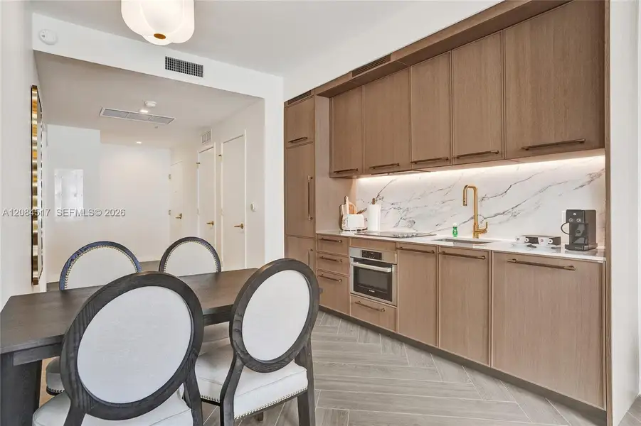Furnished interior view inside a new home in , Miami (Image 7).