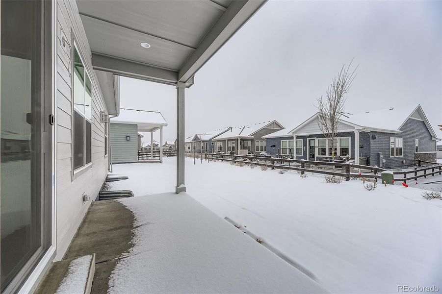 Exterior details and patio area of a home in Hilltop 55+ at Inspiration 55s, Aurora (Image 18).