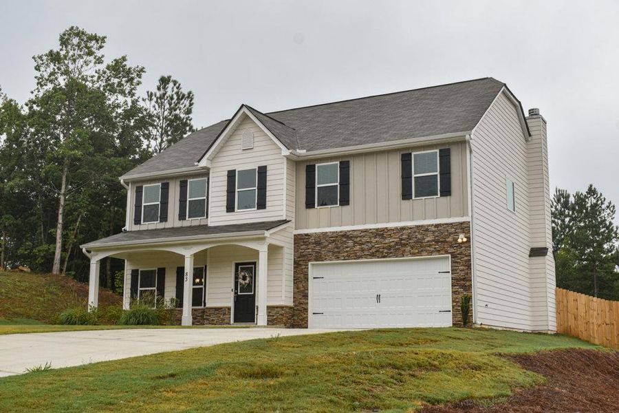 Front exterior of a new home in , Dallas, GA, highlighting curb appeal (Image 30). Front exterior of a new home in , Dallas, GA, highlighting curb appeal (Image 30).