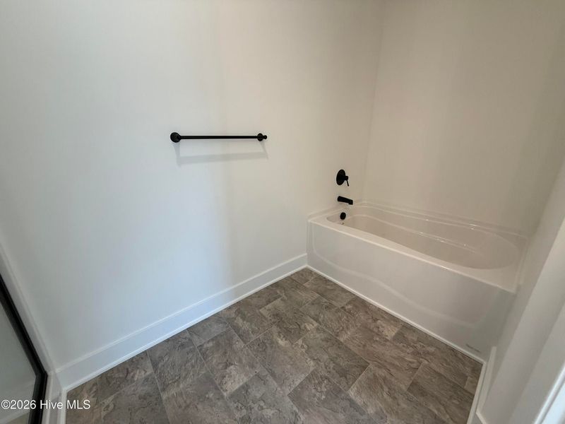 Spacious, unfurnished interior of a new home in Wood Creek Landing, Leland (Image 33). Spacious, unfurnished interior of a new home in Wood Creek Landing, Leland (Image 33).