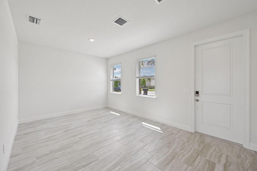 Furnished interior view inside a new home in Brystol at Wylder - Reserve Series, Port St. Lucie (Image 7).