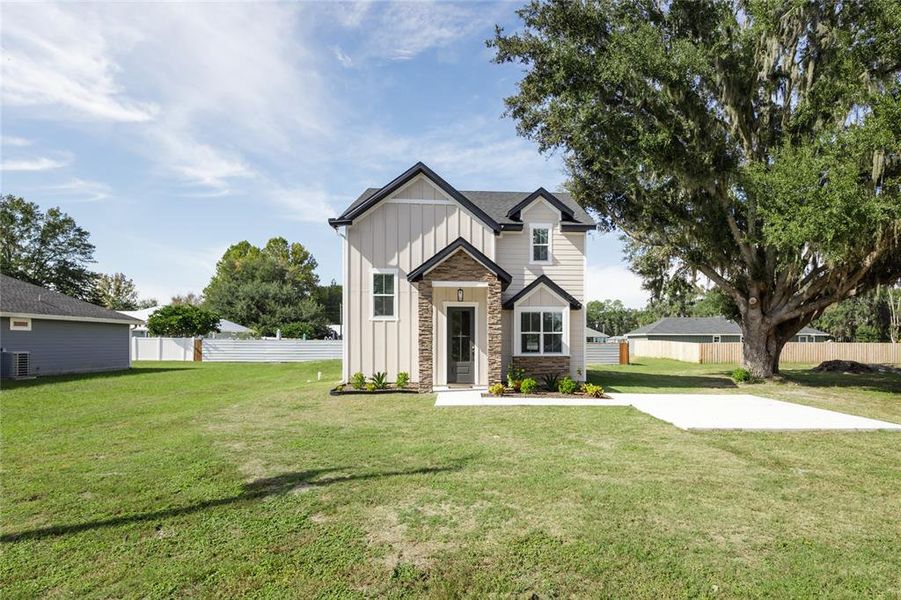 Front exterior of a new home in , Brooker, FL, highlighting curb appeal (Image 29). Front exterior of a new home in , Brooker, FL, highlighting curb appeal (Image 29).