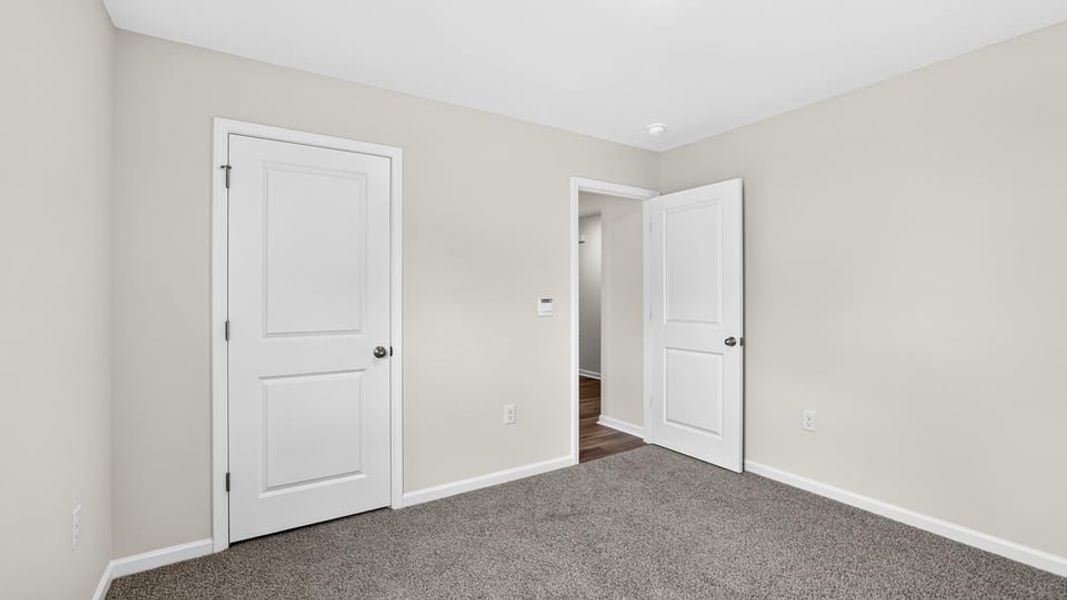 Spacious, unfurnished interior of a new home in Gibson Grove, Laurens (Image 19).