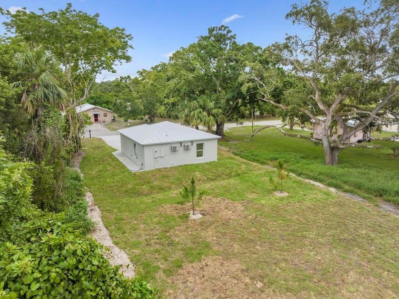 Front exterior of a new home in , Vero Beach, FL, highlighting curb appeal (Image 17). Front exterior of a new home in , Vero Beach, FL, highlighting curb appeal (Image 17).