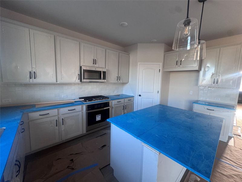 In-progress construction of a new home in Rolling Glen, Hutto, TX (Image 30).