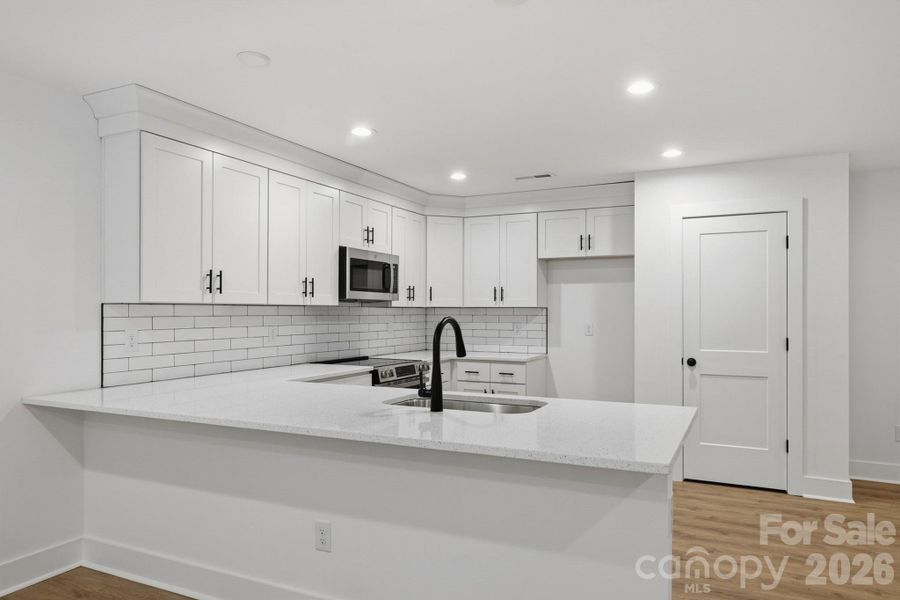 Furnished interior view inside a new home in , Statesville (Image 8).