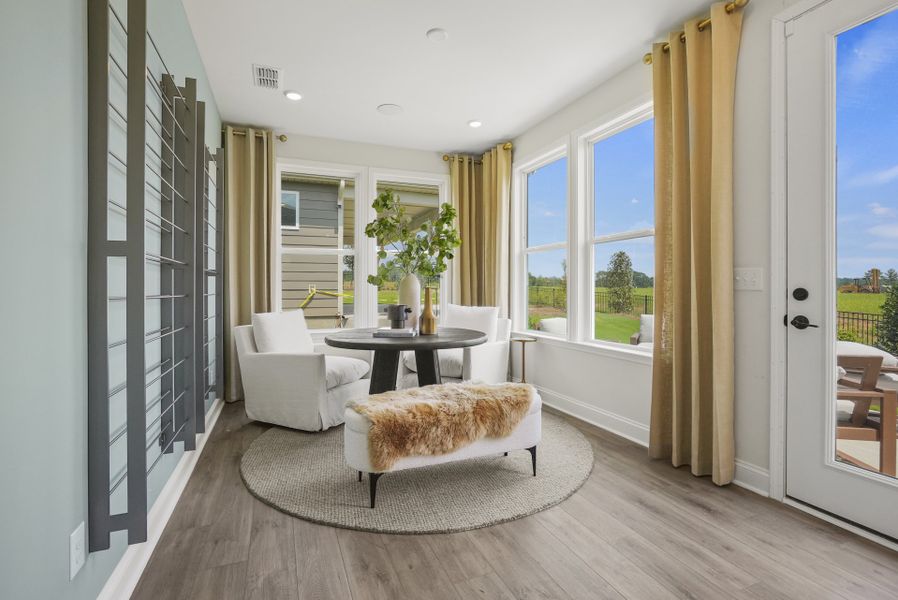 Bright and Cozy Sunroom off Kitchen