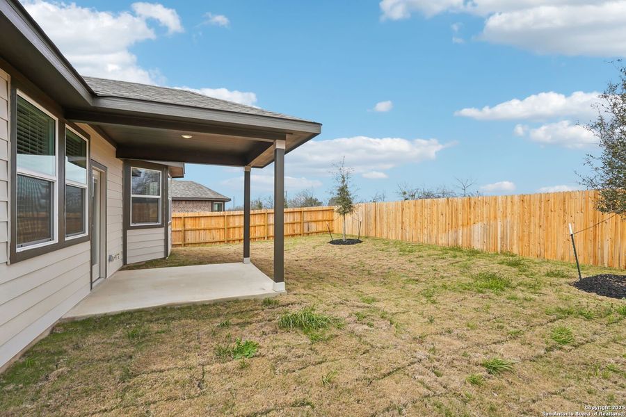 Exterior details and patio area of a home in Carmel Ranch, Schertz (Image 26).