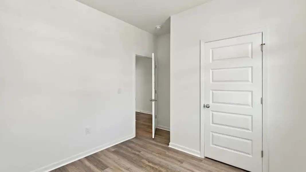 Spacious, unfurnished interior of a new home in The Lakes at North Glynn, Brunswick (Image 24).