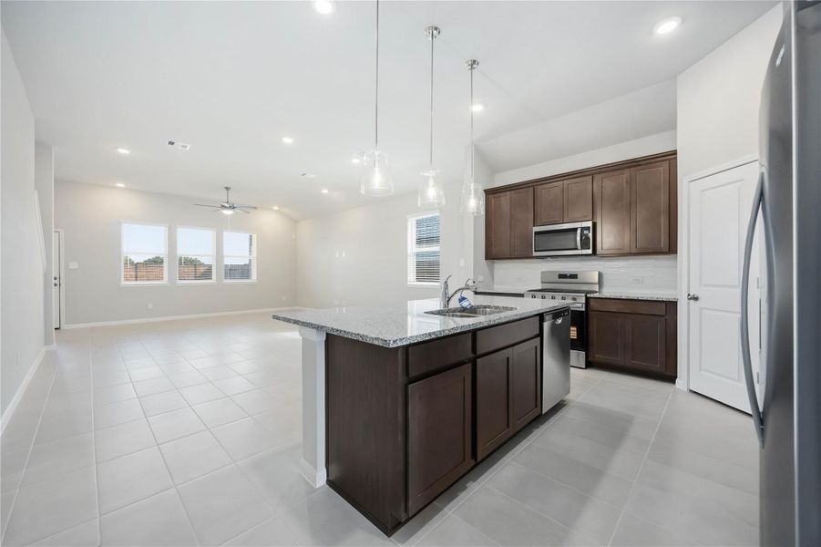 Furnished interior view inside a new home in Sunterra, Katy (Image 9).