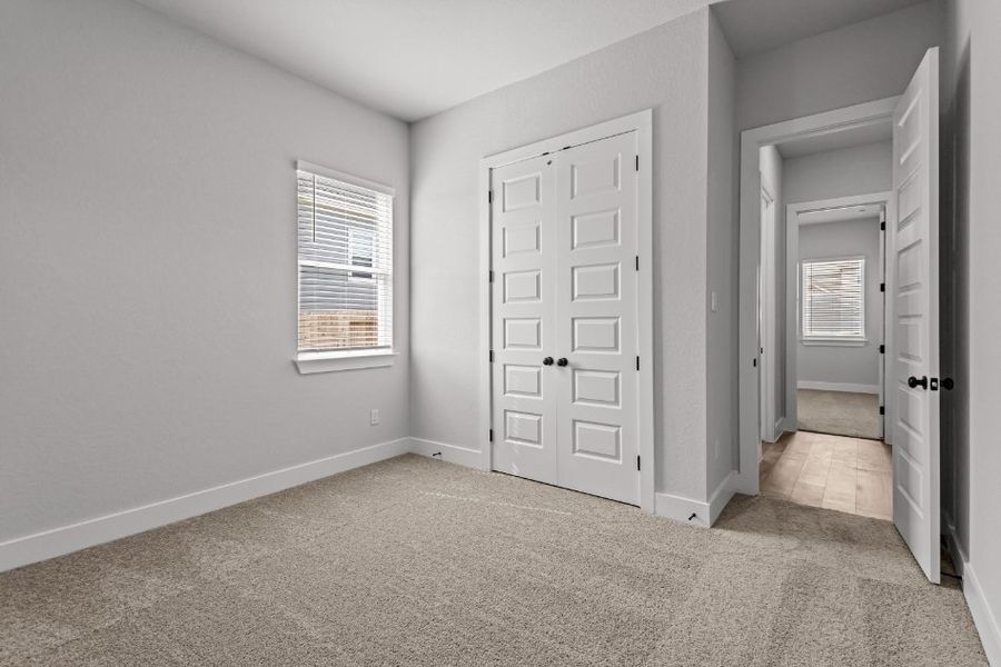 A room with white doors.