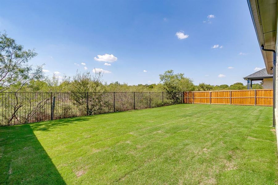 Exterior details and patio area of a home in Pecan Grove, Burleson (Image 26). Exterior details and patio area of a home in Pecan Grove, Burleson (Image 26).