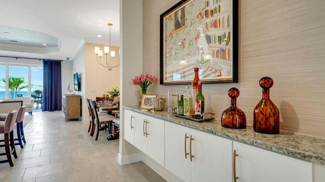 Furnished interior view inside a new home in SkySail Real Estate and Homes for Sale in Naples, FL - Neal Communities, Naples (Image 6).