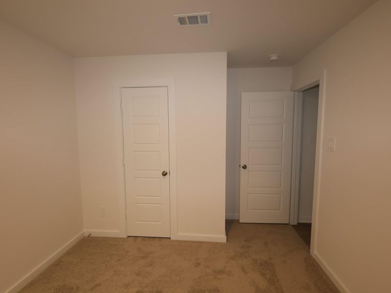 Spacious, unfurnished interior of a new home in Pinewood at Grand Texas, New Caney (Image 16).