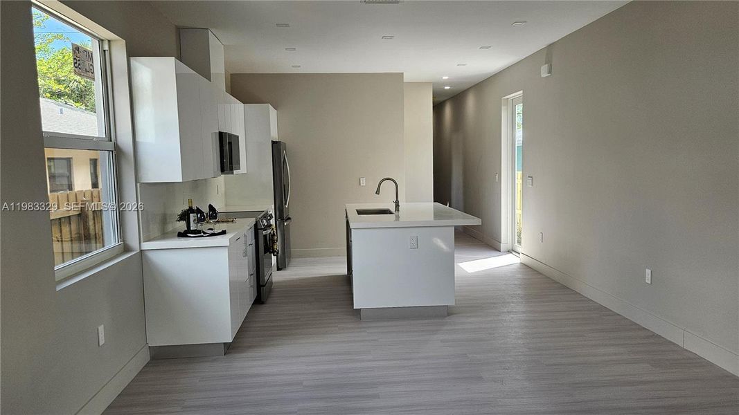 Furnished interior view inside a new home in , Fort Lauderdale (Image 7).