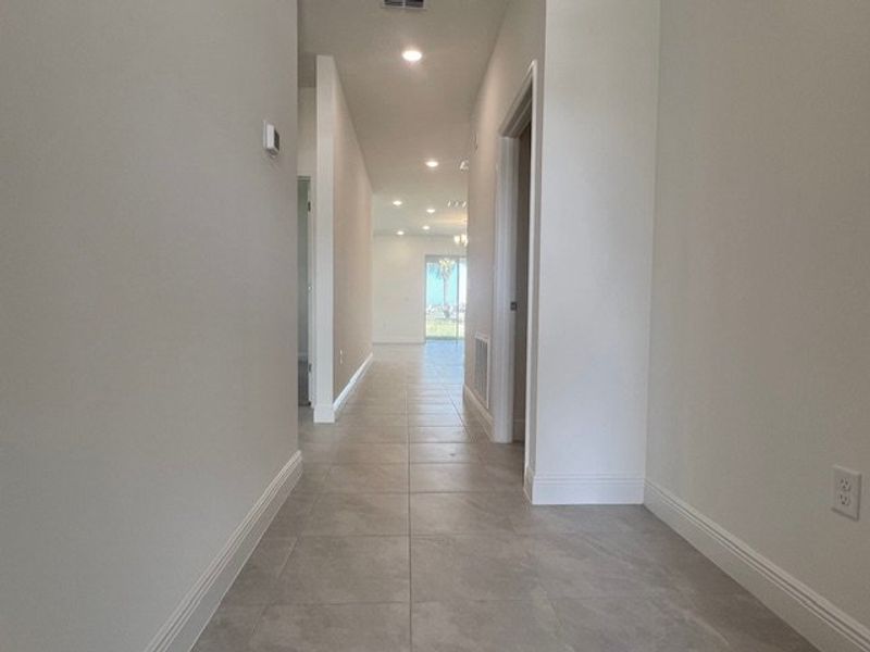 Spacious, unfurnished interior of a new home in Lakes At St Sebastian, Micco (Image 14).