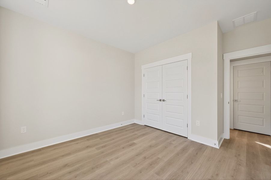 Representative unfurnished interior of a home built from the Church Hill by Hunter Quinn Homes in Huckleberry Estates, Conway (Image 23).