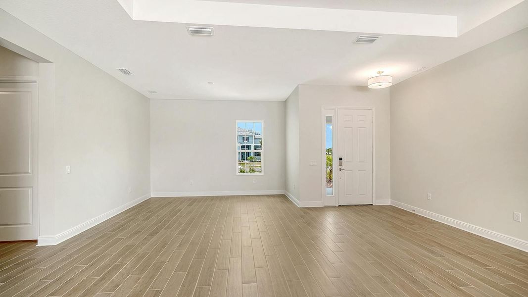 Spacious, unfurnished interior of a new home in Canoe Creek Real Estate and Homes for Sale in Parrish, FL - Neal Communities, Parrish (Image 33).