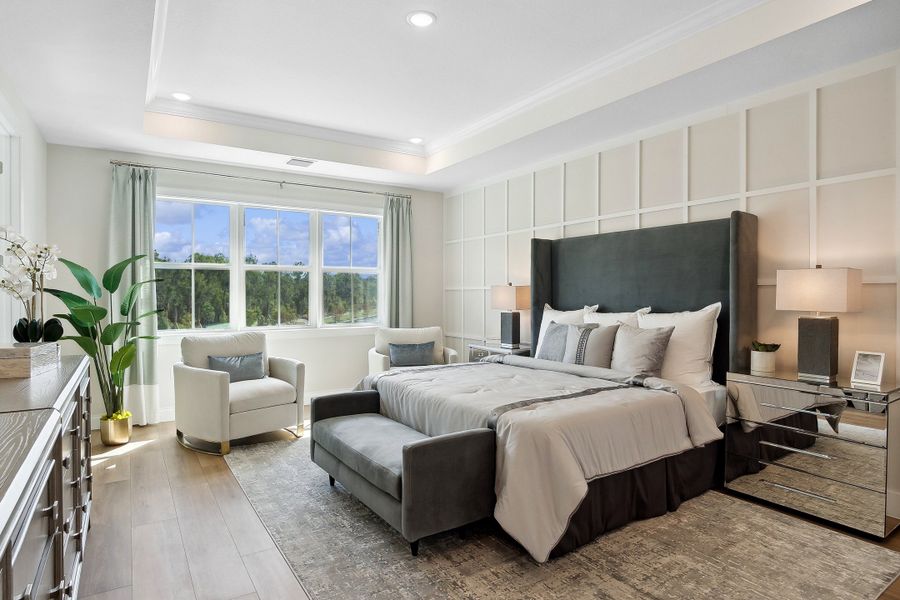 Primary suite with decorative feature wall