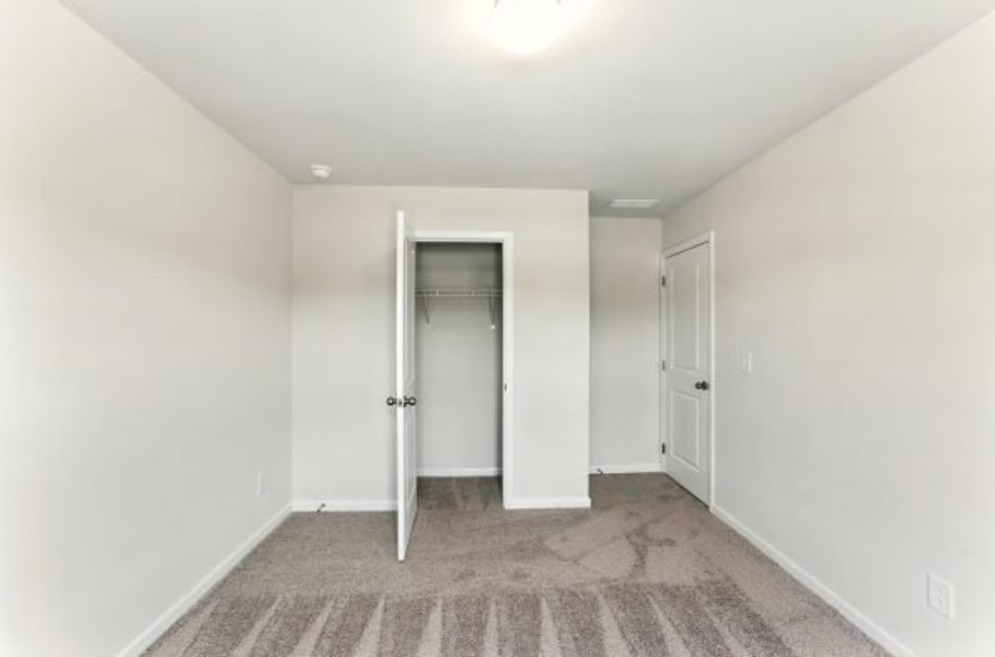 Representative unfurnished interior of a home built from the Brentwood by Piedmont Residential in Falls Creek, Flowery Branch (Image 31).