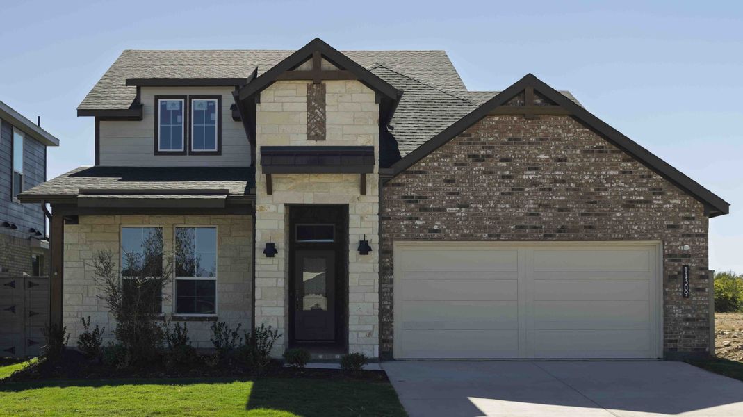 Front exterior of a new home in Treeline, Justin, TX, highlighting curb appeal (Image 1).