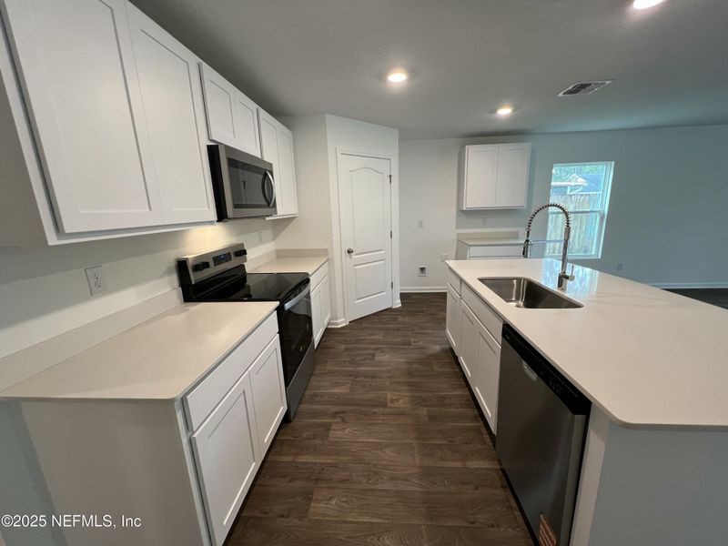 Furnished interior view inside a new home in Palm Coast Homesites, Palm Coast (Image 25).