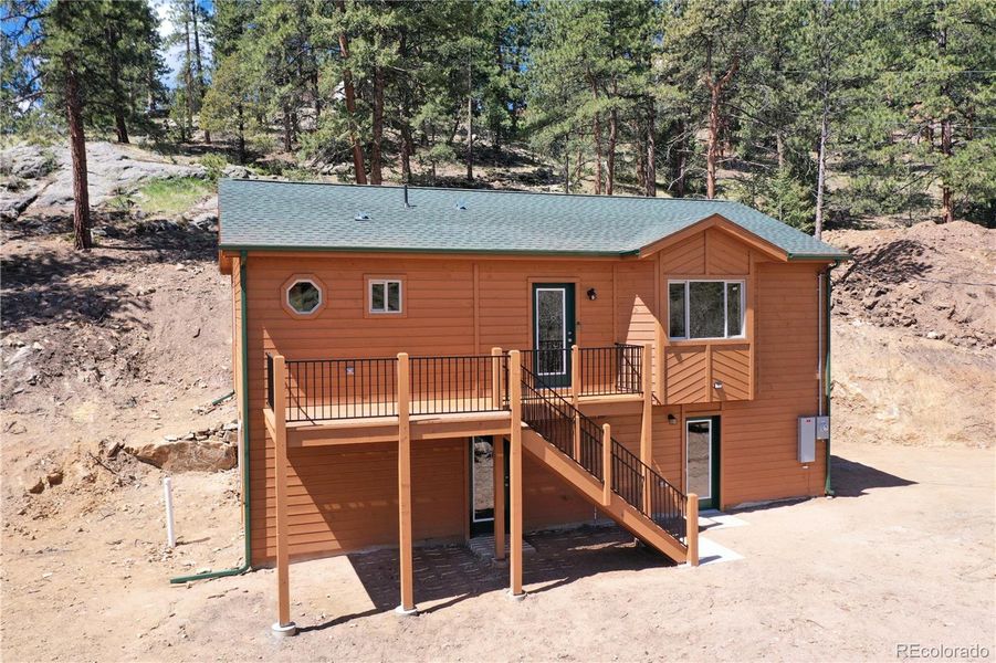 Front exterior of a new home in , Bailey, CO, highlighting curb appeal (Image 1). Front exterior of a new home in , Bailey, CO, highlighting curb appeal (Image 1).