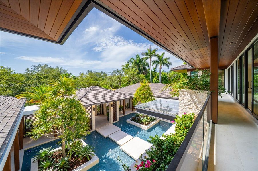 Exterior details and patio area of a home in , Coral Gables (Image 19).
