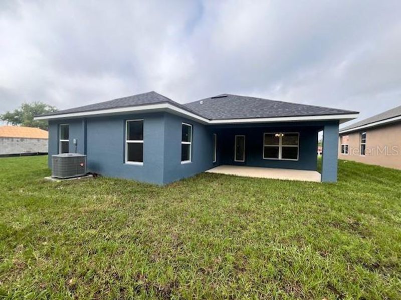 Exterior details and patio area of a home in Abbey Glen, Dade City (Image 16). Exterior details and patio area of a home in Abbey Glen, Dade City (Image 16).