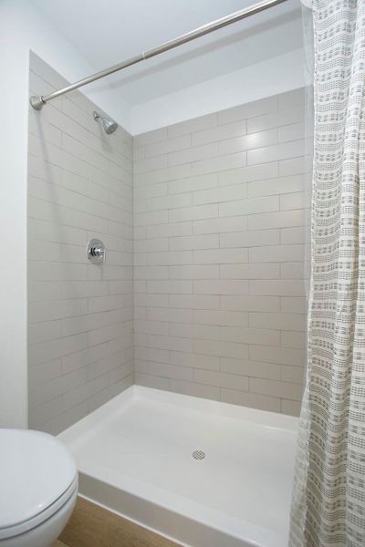 Furnished interior view inside a new home in , Conroe (Image 11).