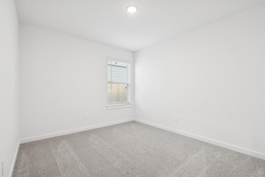 Spacious, unfurnished interior of a new home in Pinewood at Grand Texas, New Caney (Image 17).