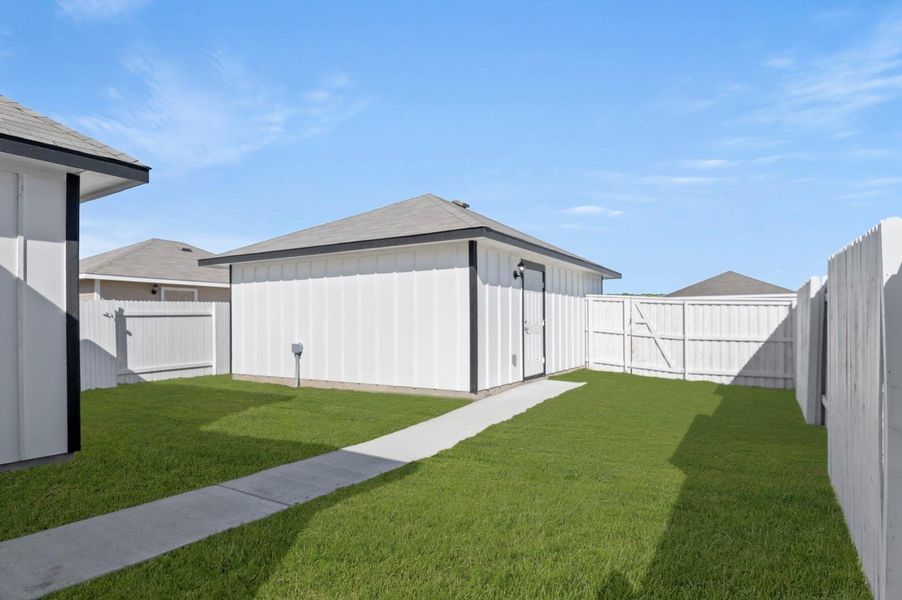 Exterior details and patio area of a home in Casetta Ranch, Kyle (Image 4).