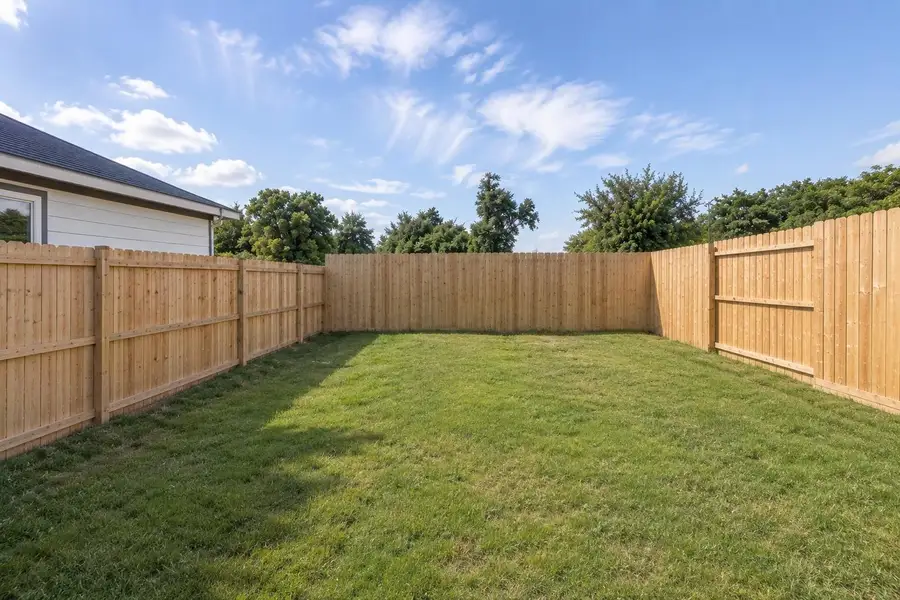 Exterior details and patio area of a home in , Houston (Image 3).