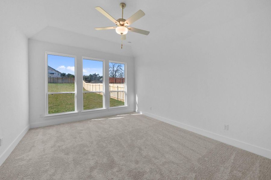 Primary Bedroom with elevated ceiling