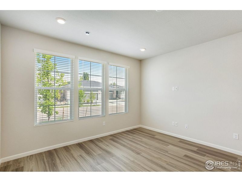 Spacious, unfurnished interior of a new home in Westside Crossing, Berthoud (Image 32).