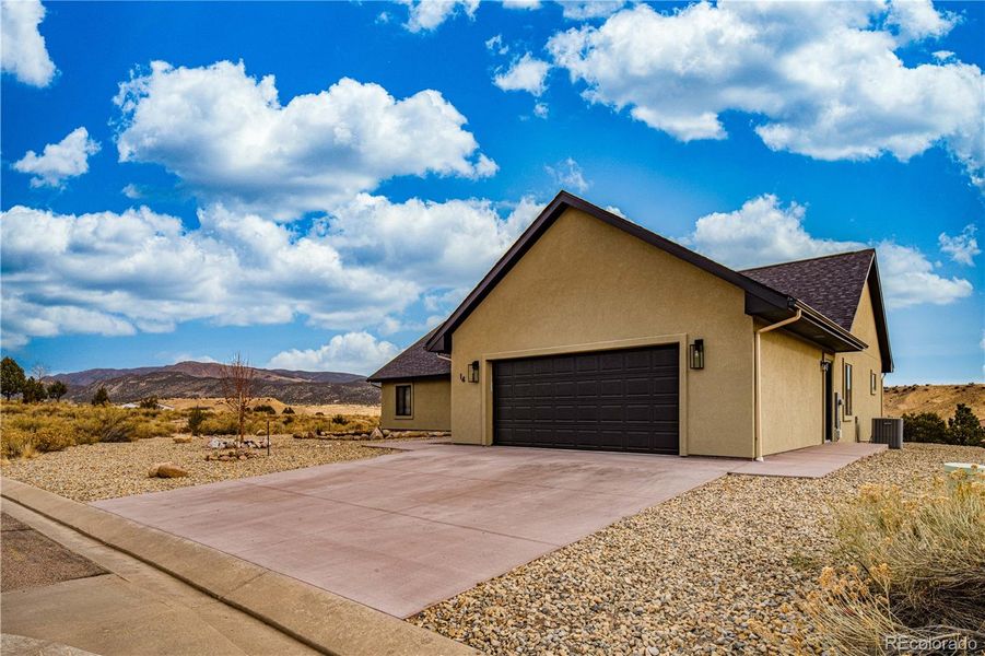 Front exterior of a new home in , Cañon City, CO, highlighting curb appeal (Image 1). Front exterior of a new home in , Cañon City, CO, highlighting curb appeal (Image 1).