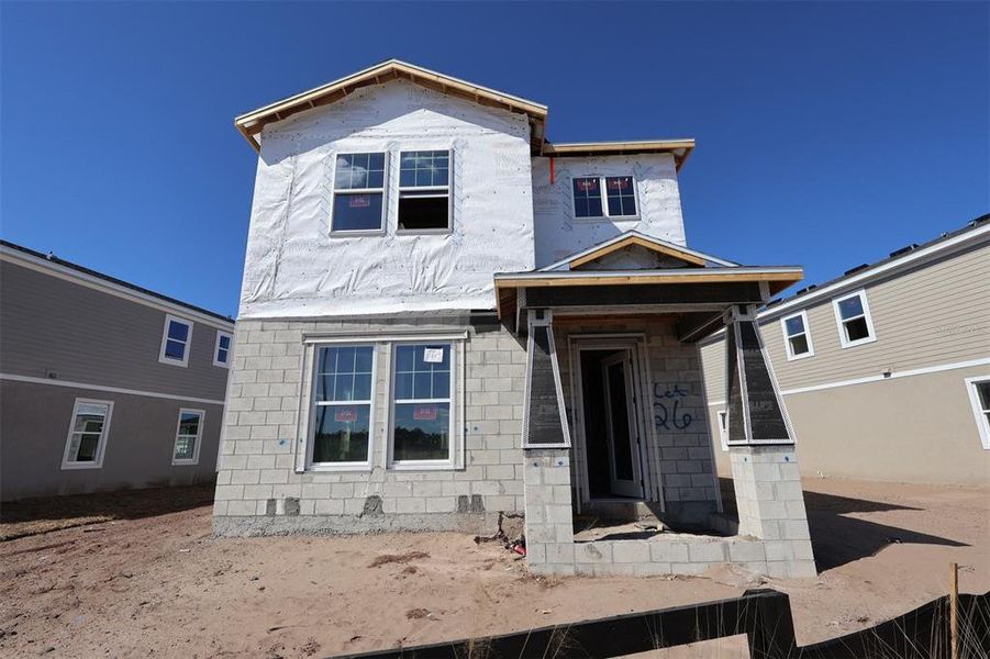 In-progress construction of a new home in Center Lake on the Park, St. Cloud, FL (Image 10).