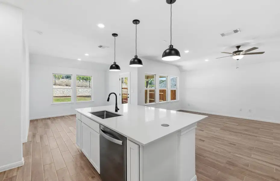 Furnished interior view inside a new home in West Cypress Hills, Spicewood (Image 10).