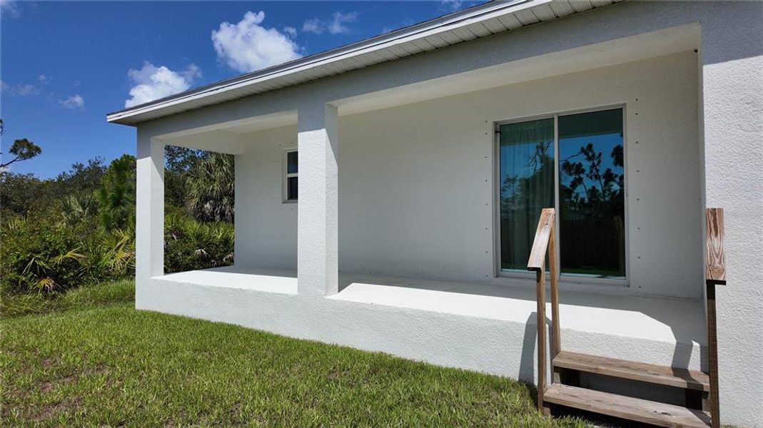 Exterior details and patio area of a home in South Gulf Cove, Port Charlotte (Image 22). Exterior details and patio area of a home in South Gulf Cove, Port Charlotte (Image 22).