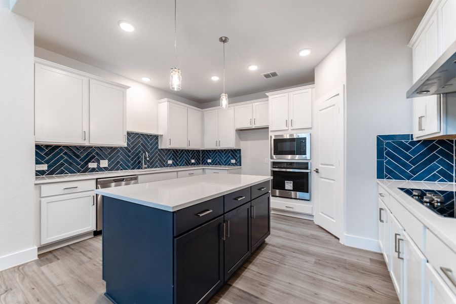 Furnished interior view inside a new home in The Woodlands at Medina Hills, Mico (Image 4).