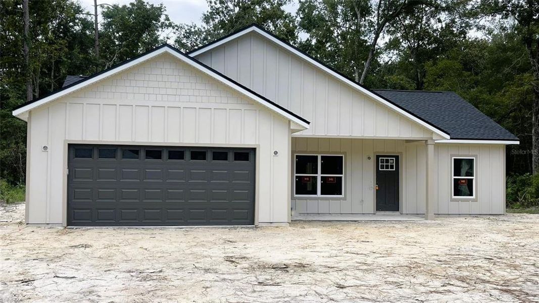 Front exterior of a new home in , Chiefland, FL, highlighting curb appeal (Image 16).