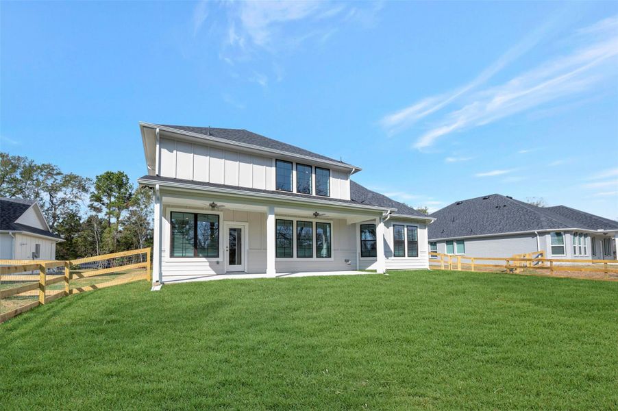 Exterior details and patio area of a home in The Oaks on 6th Street, Magnolia (Image 4).