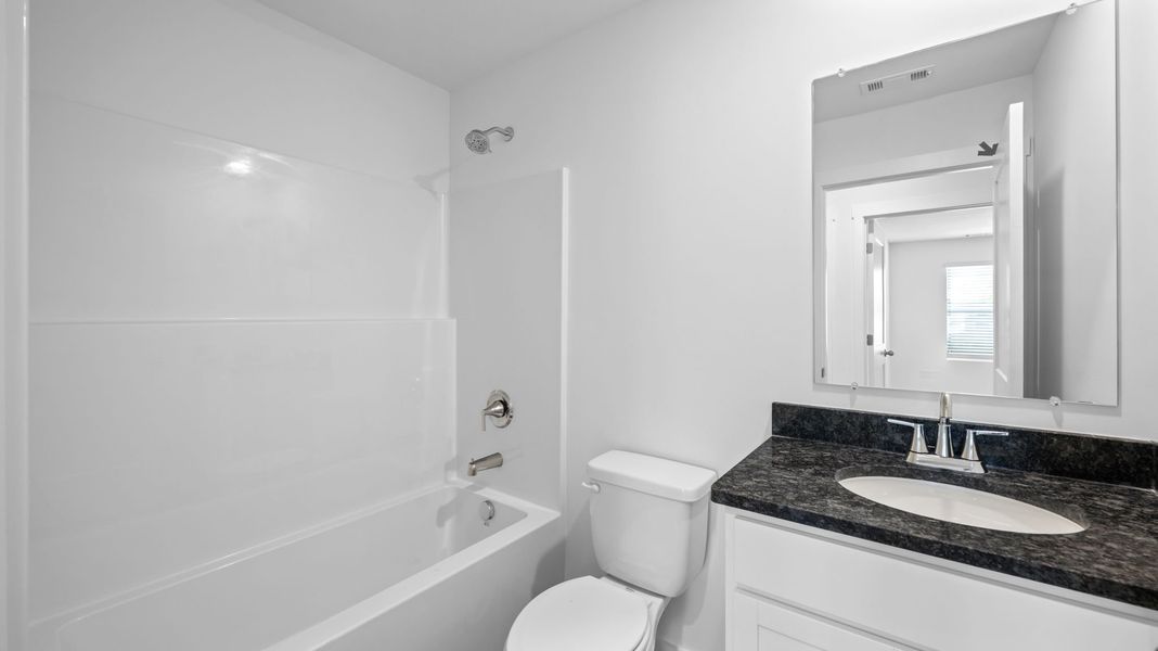 Furnished interior view inside a new home in Evergreen Landing, Rossville (Image 12).