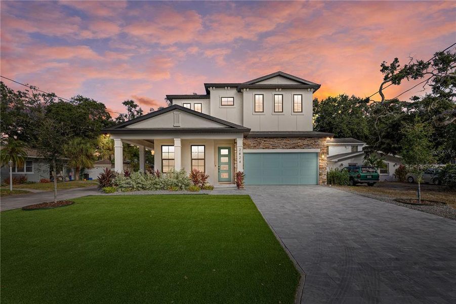 Front exterior of a new home in , Gulfport, FL, highlighting curb appeal (Image 1).