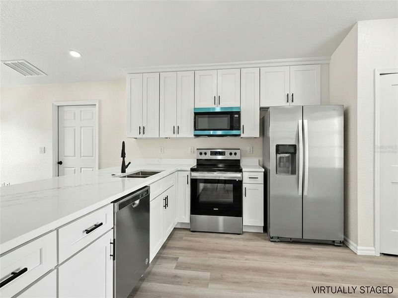 Furnished interior view inside a new home in , Spring Hill (Image 9).