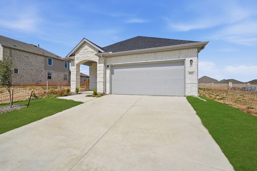 Front exterior of a new home in Westridge, McKinney, TX, highlighting curb appeal (Image 29).