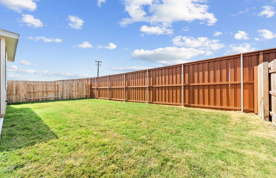 Exterior details and patio area of a home in Sunfield, Buda (Image 1). Exterior details and patio area of a home in Sunfield, Buda (Image 1).