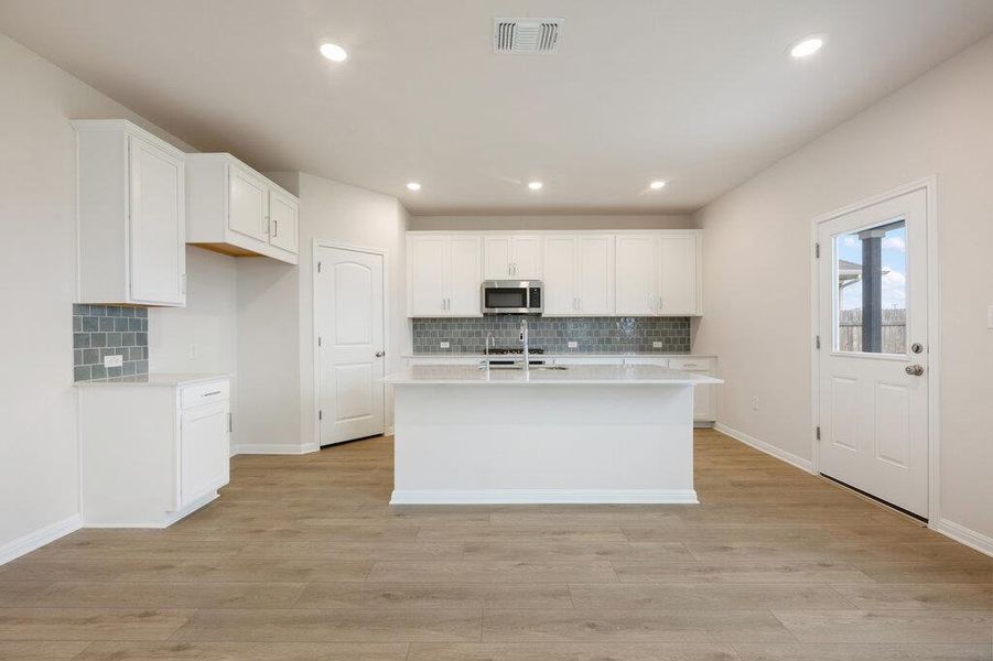 Furnished interior view inside a new home in Covered Bridge, Hutto (Image 17).