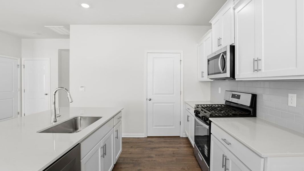 Furnished interior view inside a new home in Durbin Meadows Traditions, Fountain Inn (Image 12).
